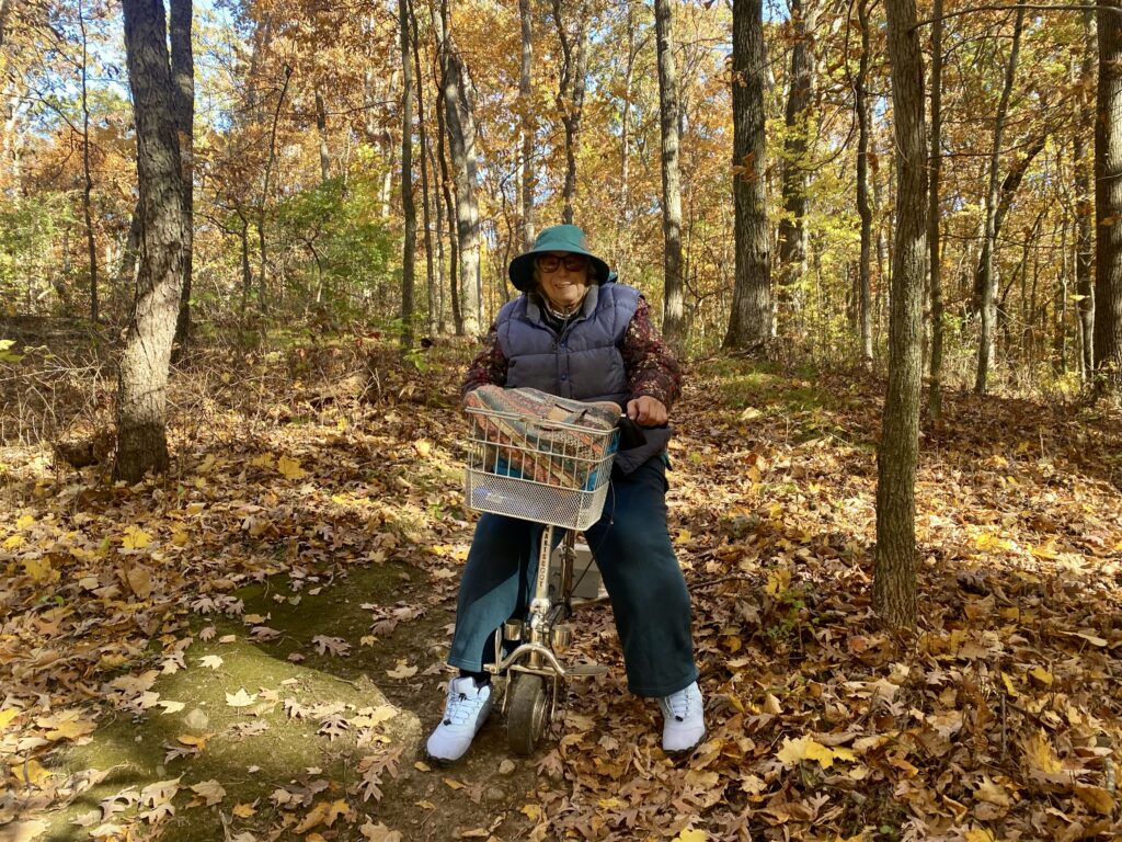 Barbara Brodsky out in the beautiful fall woods